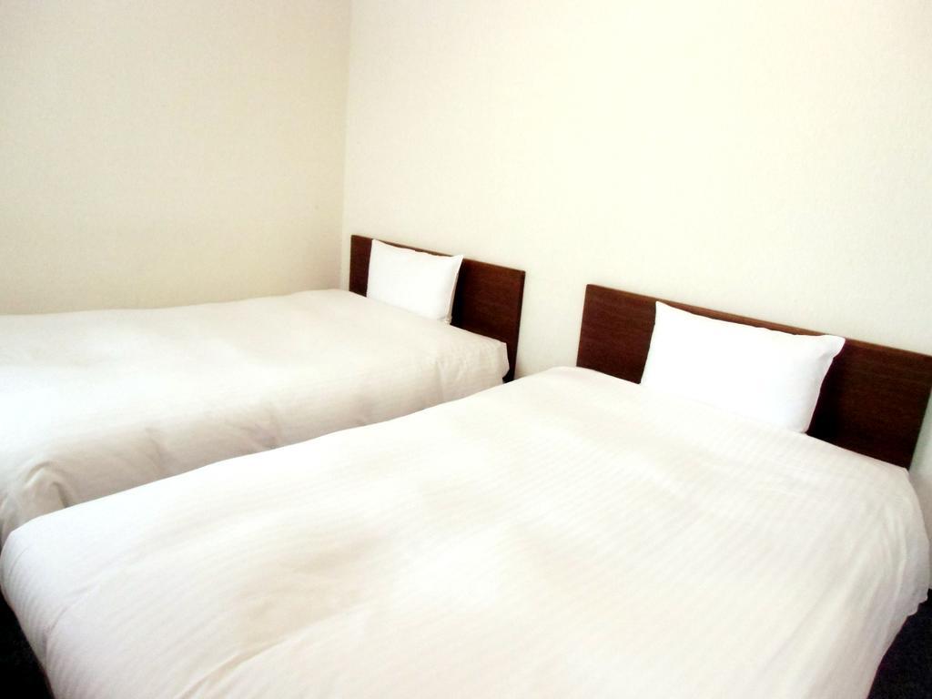 Hotel Green Line Sendai Quarto foto